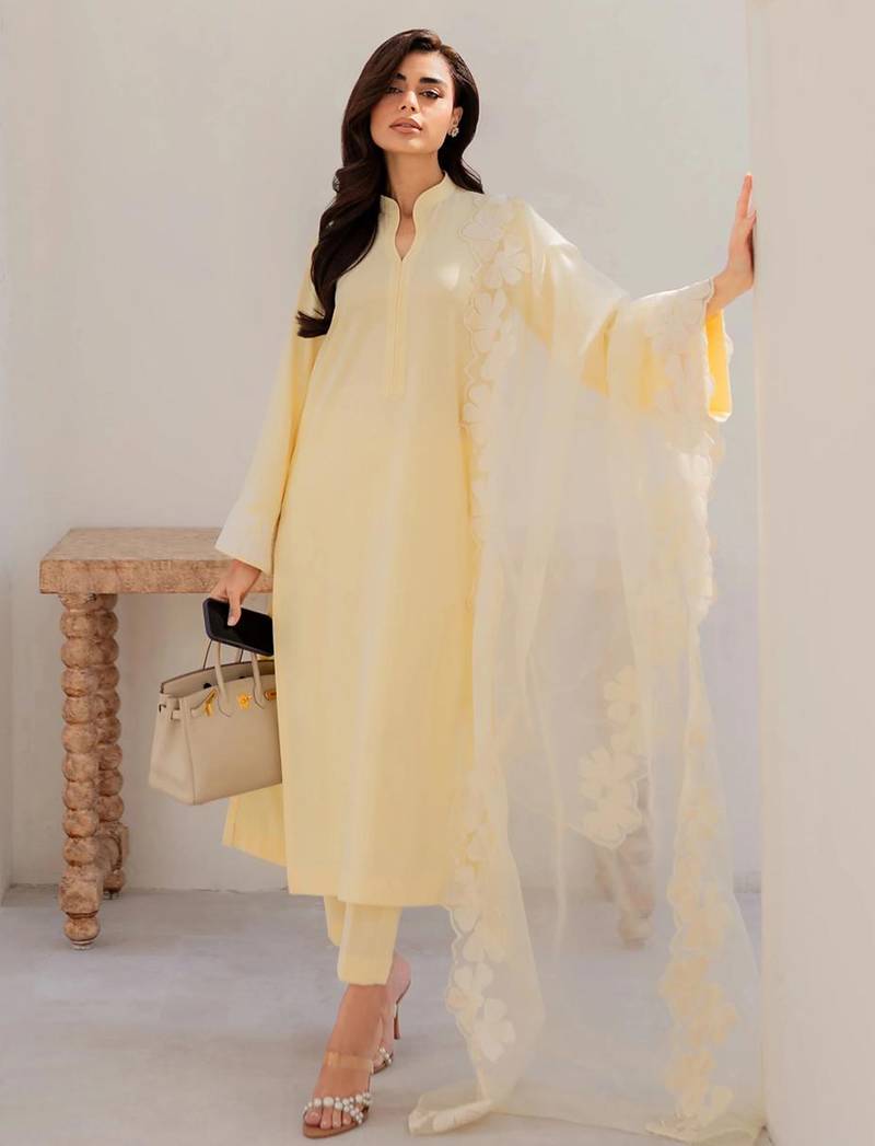 Yellow chanderi silk heavy thread embroidery on sleeve and dupatta kurta pant set