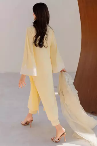 Yellow chanderi silk heavy thread embroidery on sleeve and dupatta kurta pant set