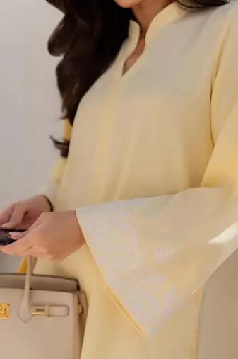 Yellow chanderi silk heavy thread embroidery on sleeve and dupatta kurta pant set