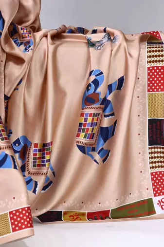 cream satin saree with folk printed designs