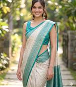 Off white sky kanjivaram silk blend banarasi saree with unstitched blouse piece
