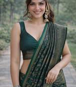 Green silk blend banarasi saree with unstitched blouse piece