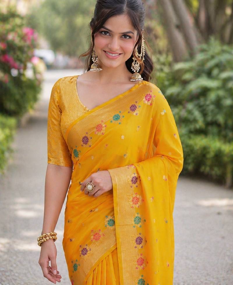 Yeloow soft silk banarasi jacuard work designer party wear saree with unstitched blouse piece