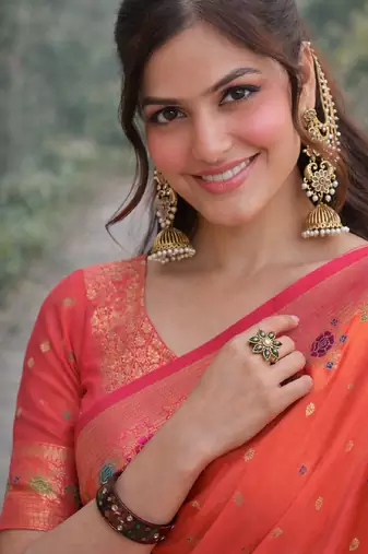 Orange silk blend banarasi saree with unstitched blouse piece