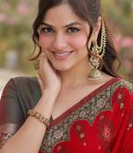 Red silk blend banarasi saree with unstitched blouse piece