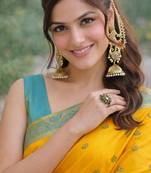Yellow silk blend banarasi saree with unstitched blouse piece