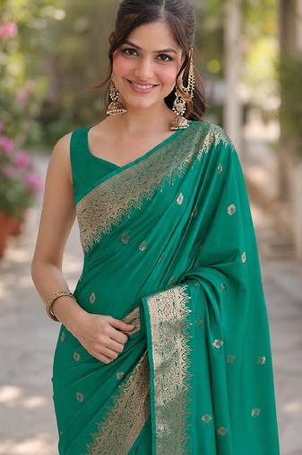 Teal green soft silk banarasi jacuard work designer party wear saree with unstitched blouse piece
