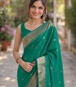 Teal green silk blend banarasi saree with unstitched blouse piece