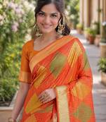 Orange silk blend banarasi saree with unstitched blouse piece