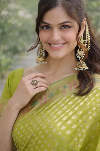 Parrot green silk blend banarasi saree with unstitched blouse piece