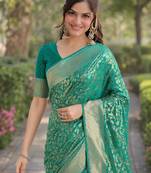 Teal green silk blend banarasi saree with unstitched blouse piece