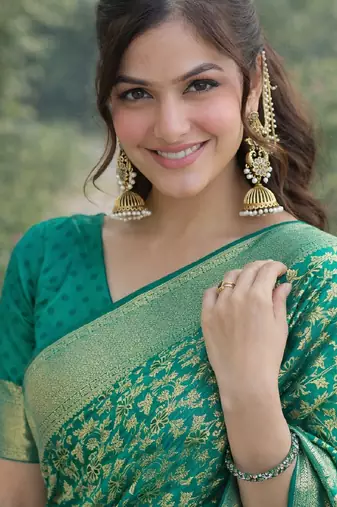 Teal green silk blend banarasi saree with unstitched blouse piece