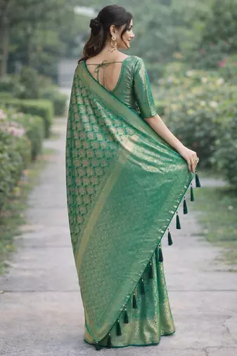Teal green silk blend banarasi saree with unstitched blouse piece