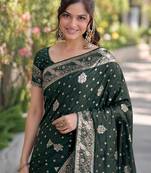 Green silk blend banarasi saree with unstitched blouse piece