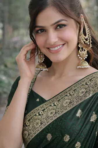Green silk blend banarasi saree with unstitched blouse piece
