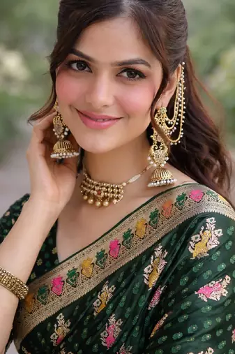 Green silk blend banarasi saree with unstitched blouse piece