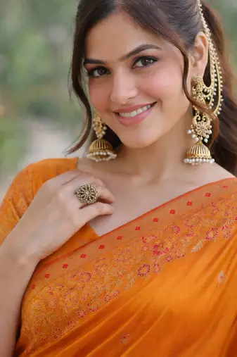 Orange silk blend banarasi saree with unstitched blouse piece