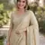 Cream soft silk blend banarasi jacuard work designer party wear saree with unstitched blouse piece