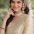 Cream soft silk banarasi jacuard work designer party wear saree with unstitched blouse piece