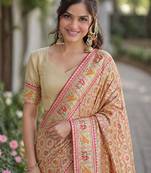 Cream silk blend banarasi saree with unstitched blouse piece