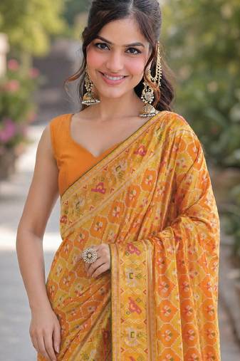 Yellow orange soft silk banarasi jacuard work designer party wear saree with unstitched blouse piece