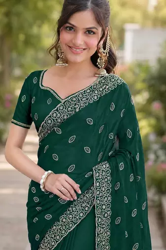Green georgette embroidery saree with unstitched blouse piece