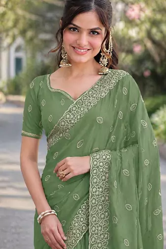 Pista georgette embroidery saree with unstitched blouse piece