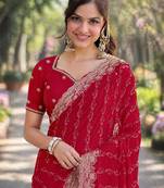 Pink georgette embroidery saree with unstitched blouse piece