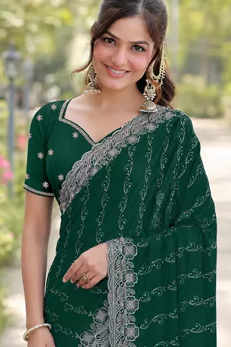 Green georgette embroidery saree with unstitched blouse piece