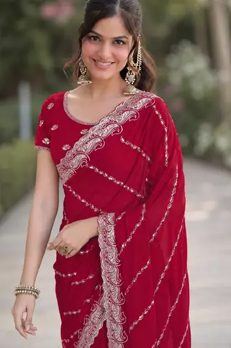 Rani pink georgette embroidery saree with unstitched blouse piece