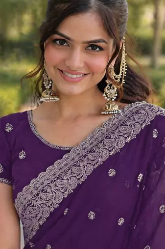 Purple georgette embroidery saree with unstitched blouse piece