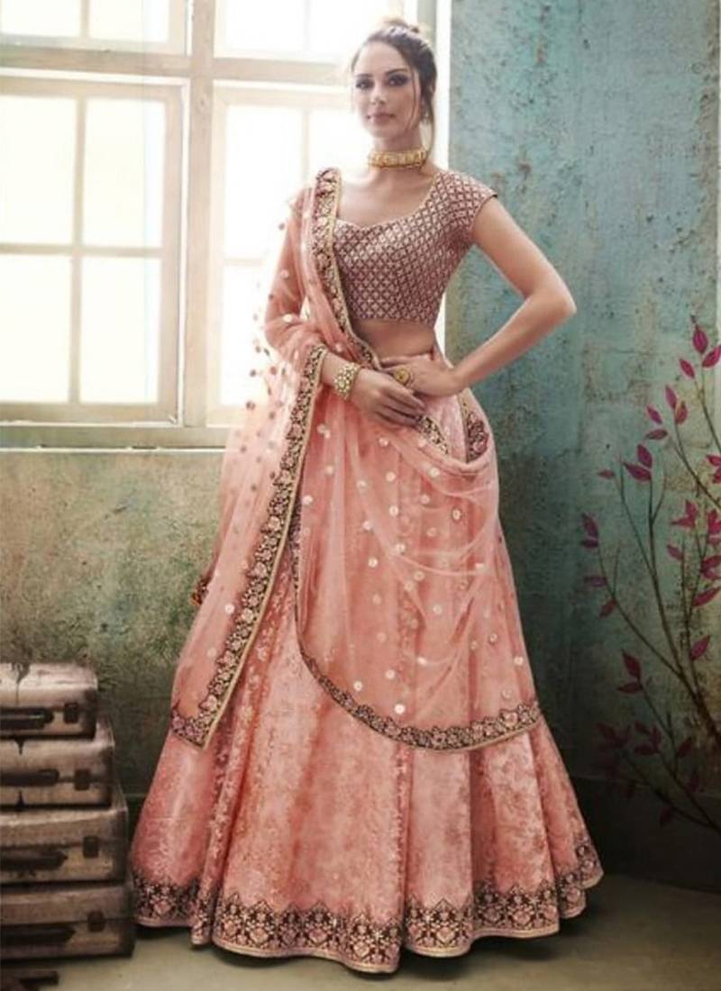Soft Premium Net Party Wear Lehenga In Peach Color With Embroidery Work & Stone Work