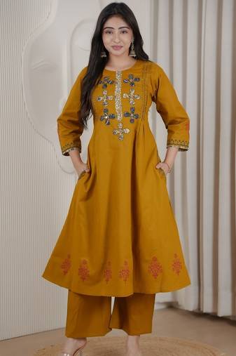 Mustard dhabu cotton a-line kurta set with applique handwork