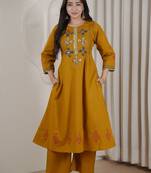 Mustard dhabu cotton a-line kurta set with applique handwork