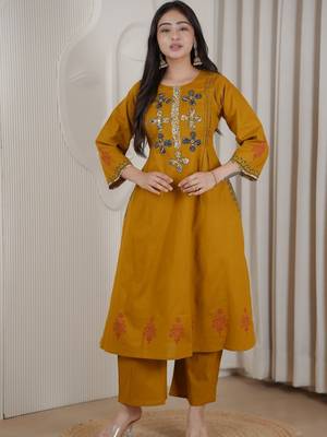 Mustard dhabu cotton a-line kurta set with applique handwork 2