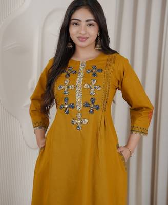 Mustard dhabu cotton a-line kurta set with applique handwork 3