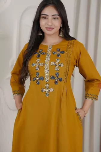 Mustard dhabu cotton a-line kurta set with applique handwork