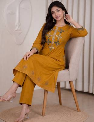 Mustard dhabu cotton a-line kurta set with applique handwork 4