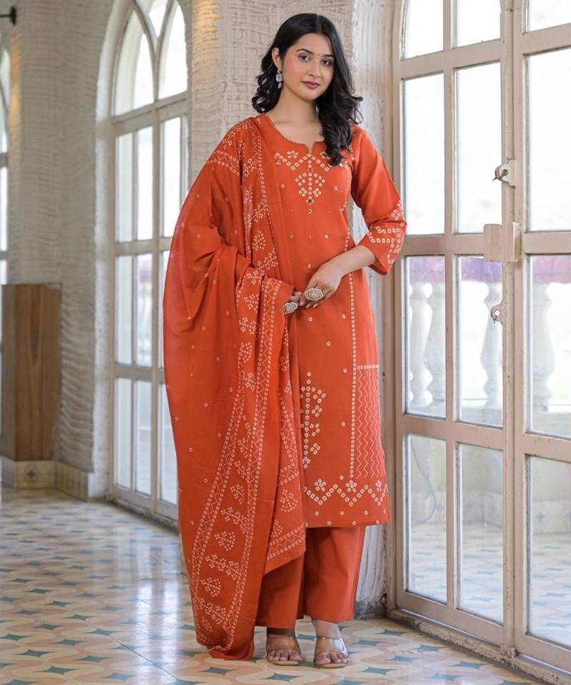 Rust orange cotton panel printed kurta set with mirror handwork and dupatta