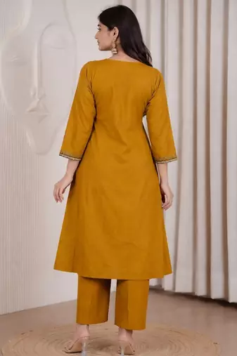 Mustard dhabu cotton a-line kurta set with applique handwork