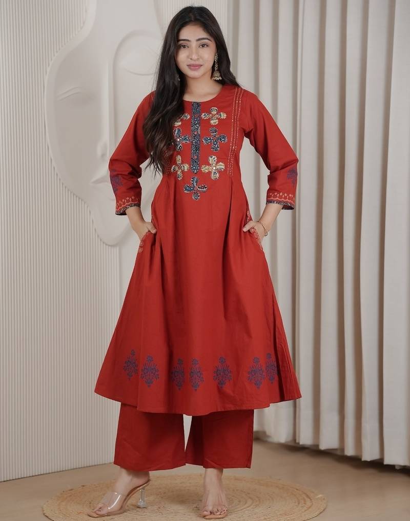 Brick red dhabu cotton a-line kurta set with applique handwork
