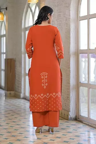 Rust orange cotton panel printed kurta set with mirror handwork and dupatta
