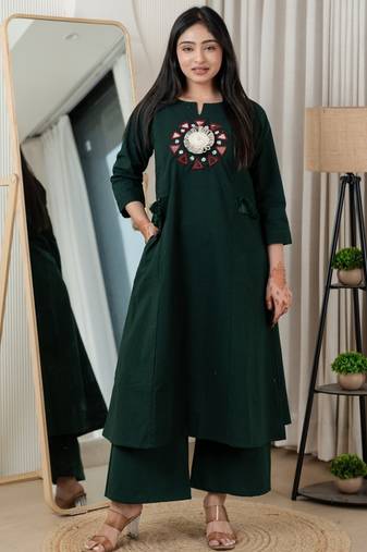 Bottle green dabu cotton a-line kurta set with handcrafted mirror work embroidery