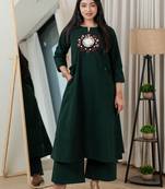 Bottle green dabu cotton a-line kurta set with handcrafted mirror work embroidery