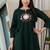 Bottle green dabu cotton a-line kurta set with handcrafted mirror work embroidery