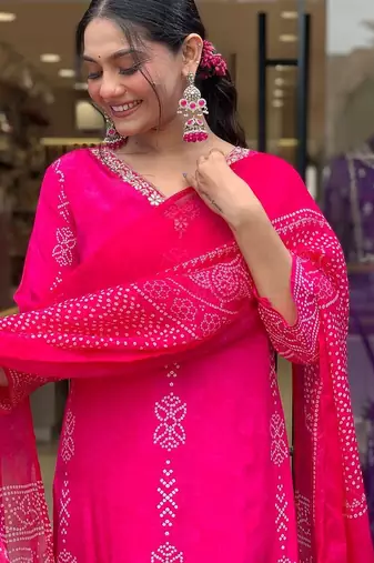 Pink french crepe v-neck kurta with sequin and stone embroidery printed chinon dupatta for elegant festive wear.