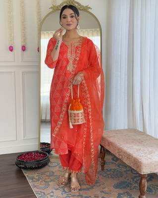 Women's orange sequin embroidered french crepe kurta pant set with organza dupatta 4