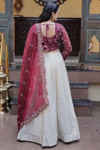 off white silk engagement lehenga with zari sequins work