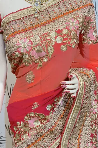 red georgette embroidered saree with blouse
