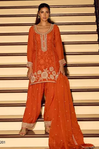 Orange chinon silk full stitched free size palazzo suits upto 42